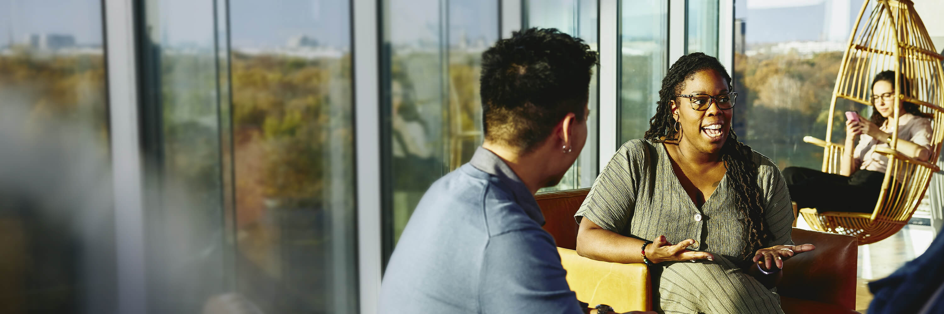 Interview of employees of different nationalities during a break at work in the office.