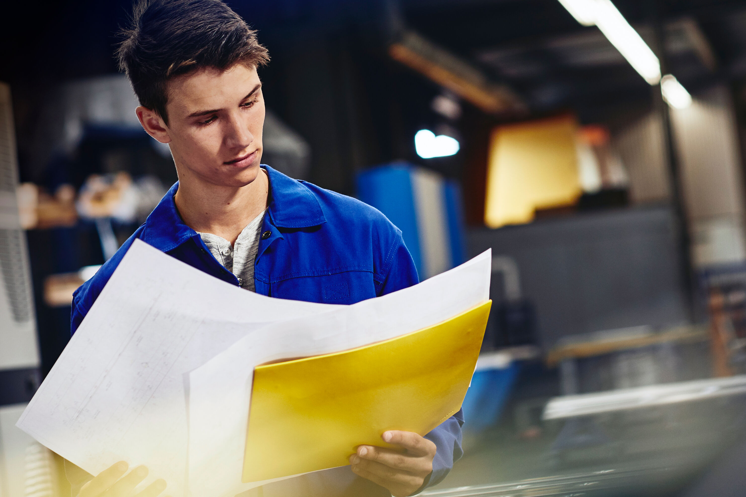A man looking at reports
